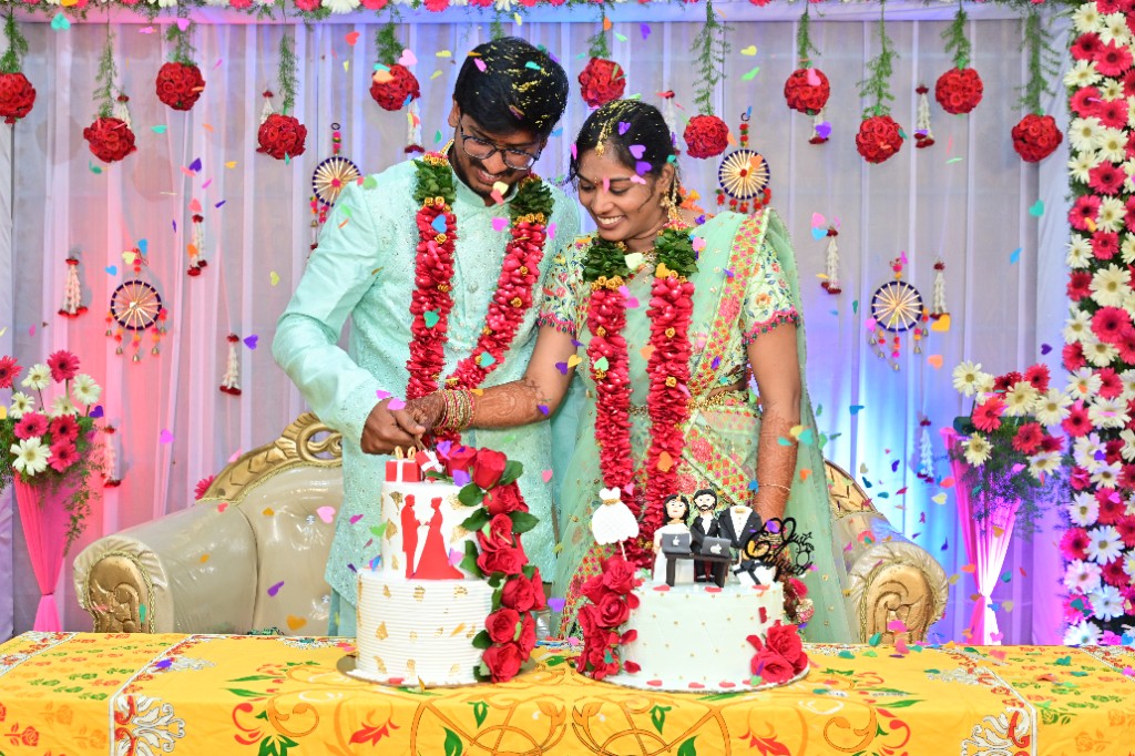Srinu and Sai cutting their engagement cake together