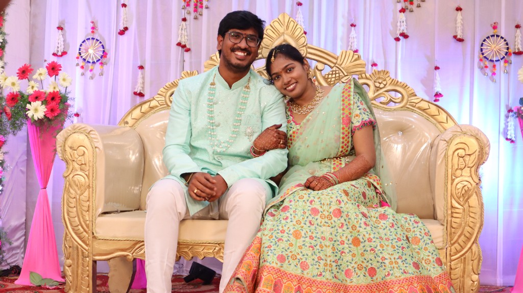 Sai leaning on Srinu's shoulder during engagement shoot