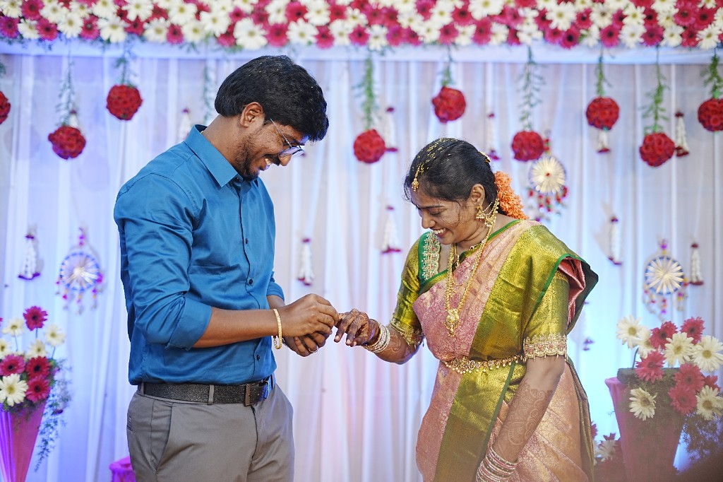 Close-up of engagement ring exchange